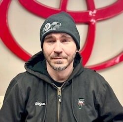 Staff member Angus MacAskill from ID_2e323b