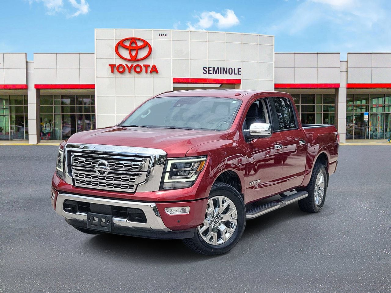 Cardinal Red Metallic 2021 Nissan Titan Pickup Truck Four-Wheel Drive 9-Speed Automatic