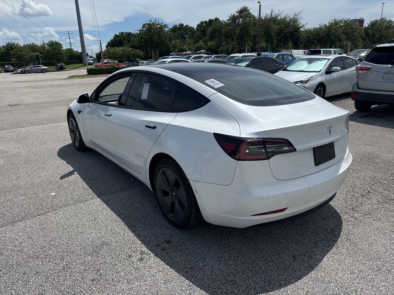 Used 2022 Tesla Model 3 Base with VIN 5YJ3E1EA3NF101709 for sale in Sanford, FL