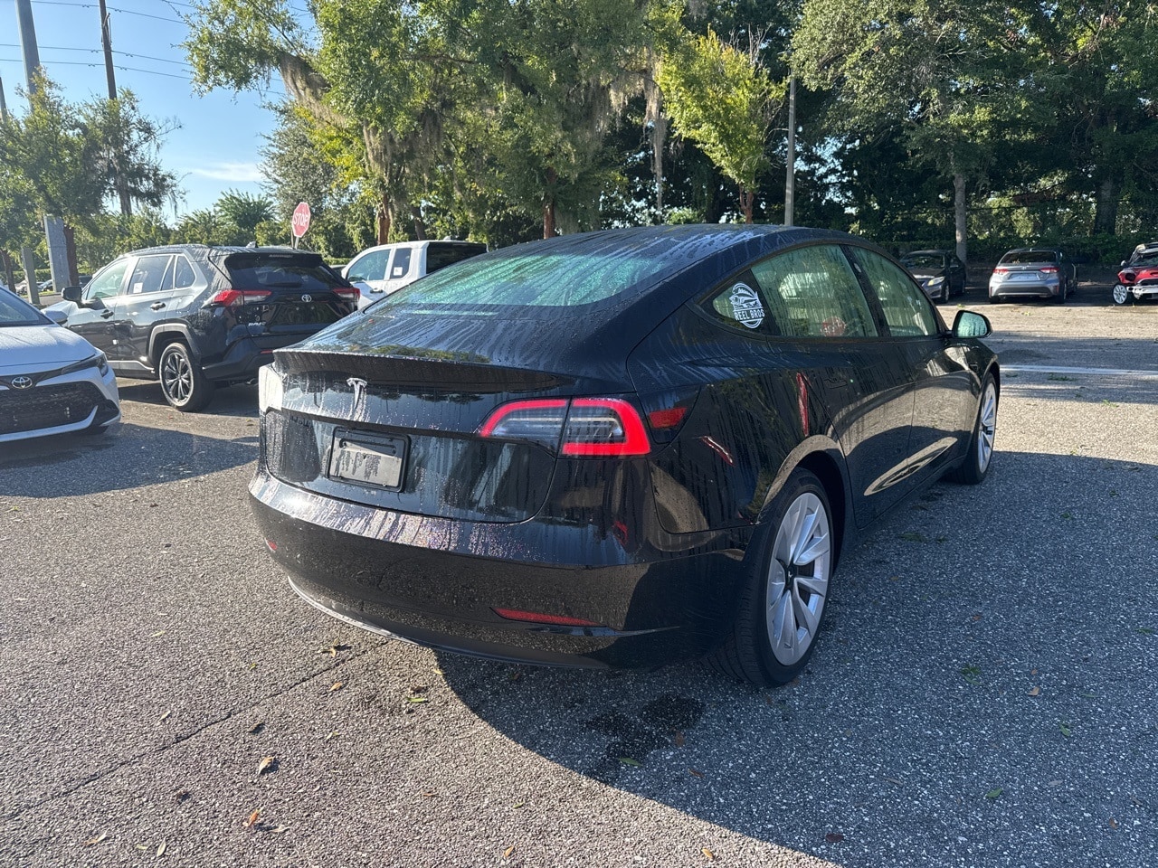 Used 2021 Tesla Model 3 Base with VIN 5YJ3E1EA0MF059191 for sale in Sanford, FL