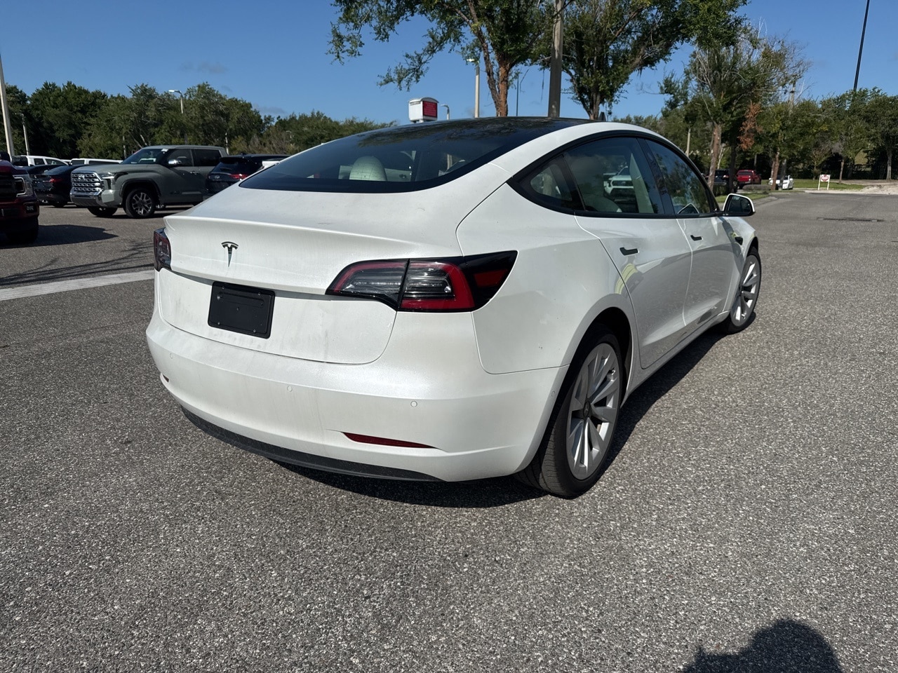 Used 2021 Tesla Model 3 Base with VIN 5YJ3E1EA7MF032327 for sale in Sanford, FL
