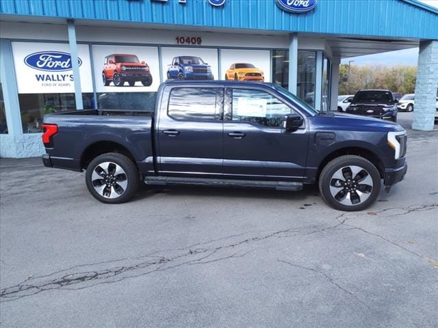 Used 2022 Ford F-150 Lightning Platinum with VIN 1FT6W1EV2NWG01725 for sale in Adams, NY
