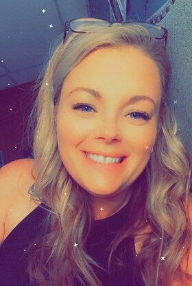 Staff member Holly Hott from ID_a4761254f091