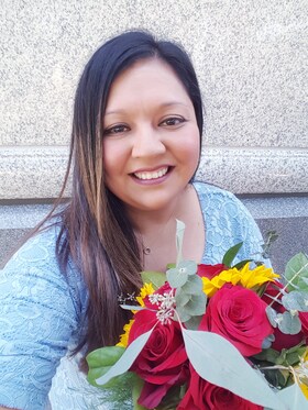 Staff member Esther Wing from ID_a4761254f091