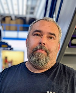 Staff member Eric Verret from 6b312e3d3ff3