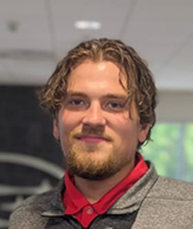 Staff member Corey Mayer from ID_210472