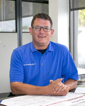 Staff member Jonathan Crooks from d42b3ede4205