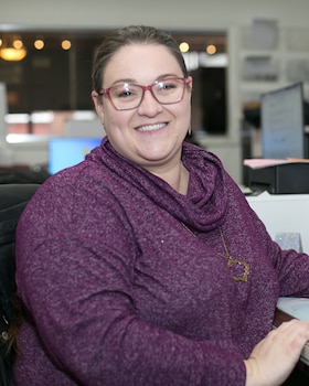 Staff member Sara McClure from 934b6fd5d6ce