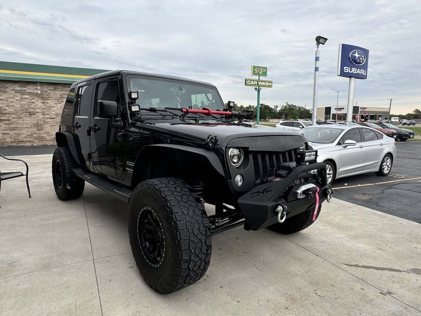 Used 2016 Jeep Wrangler Unlimited Sport S with VIN 1C4BJWDG5GL121888 for sale in Salina, KS