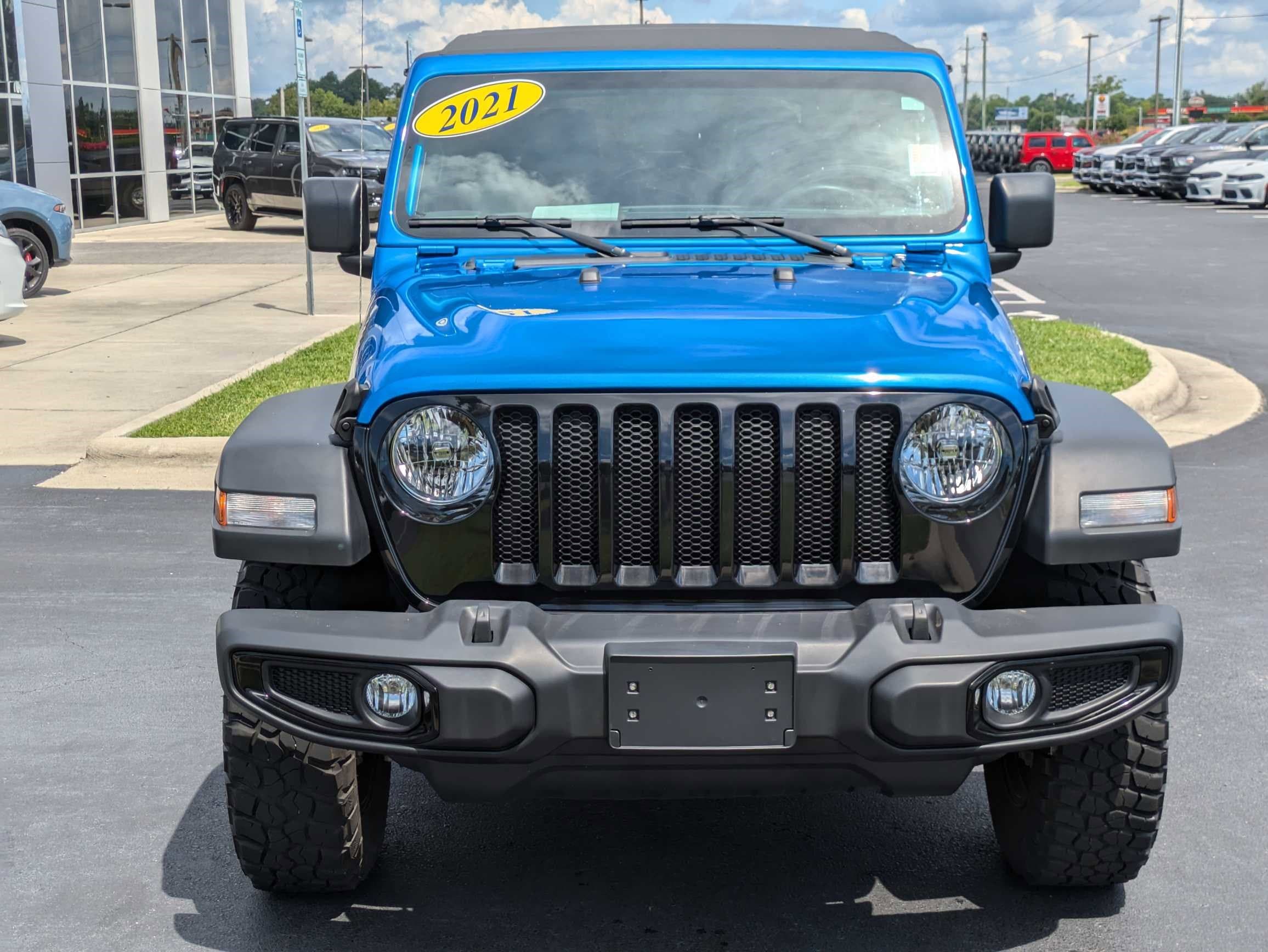 Used 2021 Jeep Wrangler Unlimited Willys Sport with VIN 1C4HJXDN9MW815296 for sale in Washington, NC