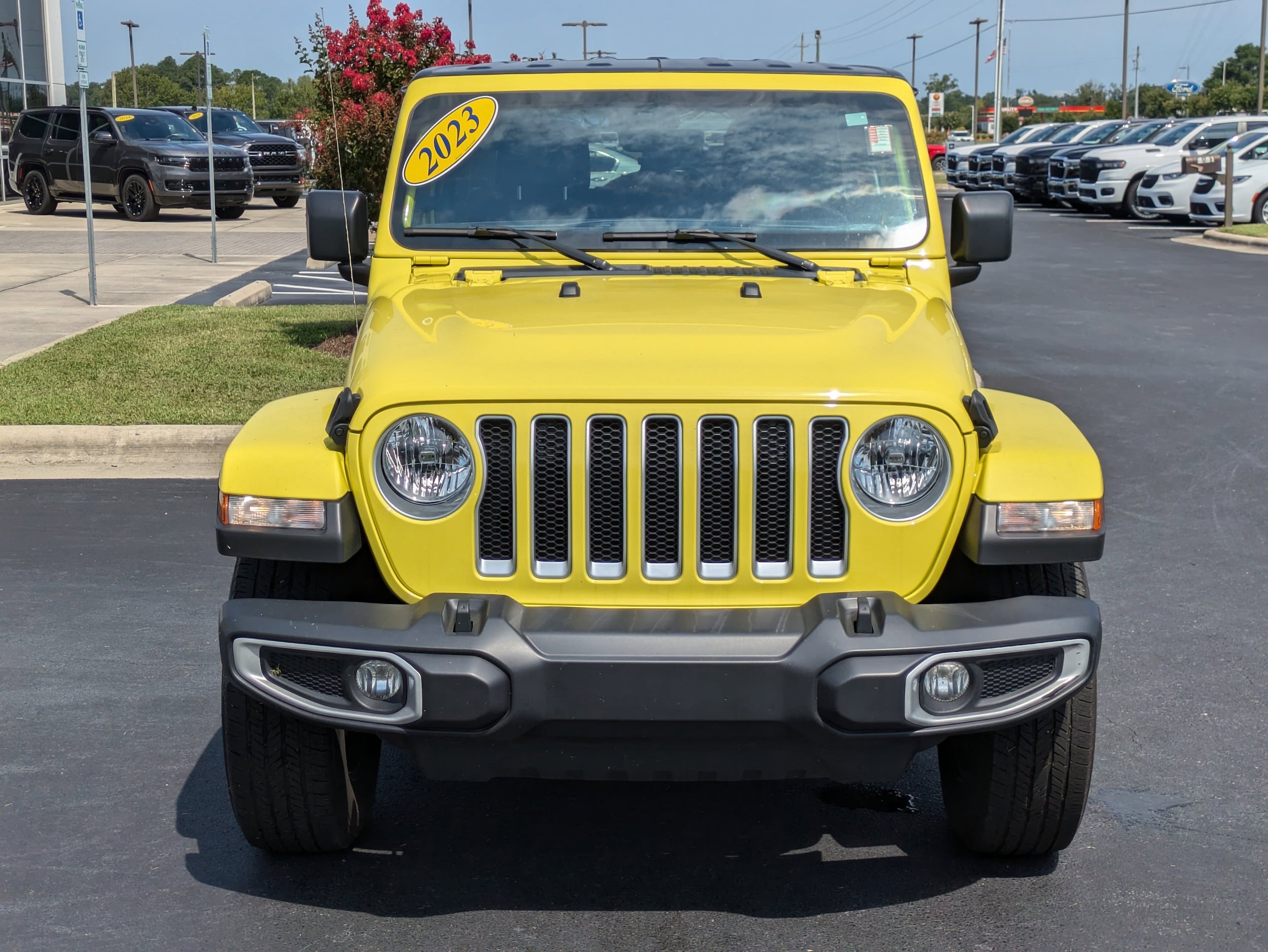 Used 2023 Jeep Wrangler 4-Door Sahara with VIN 1C4HJXEN2PW702633 for sale in Washington, NC