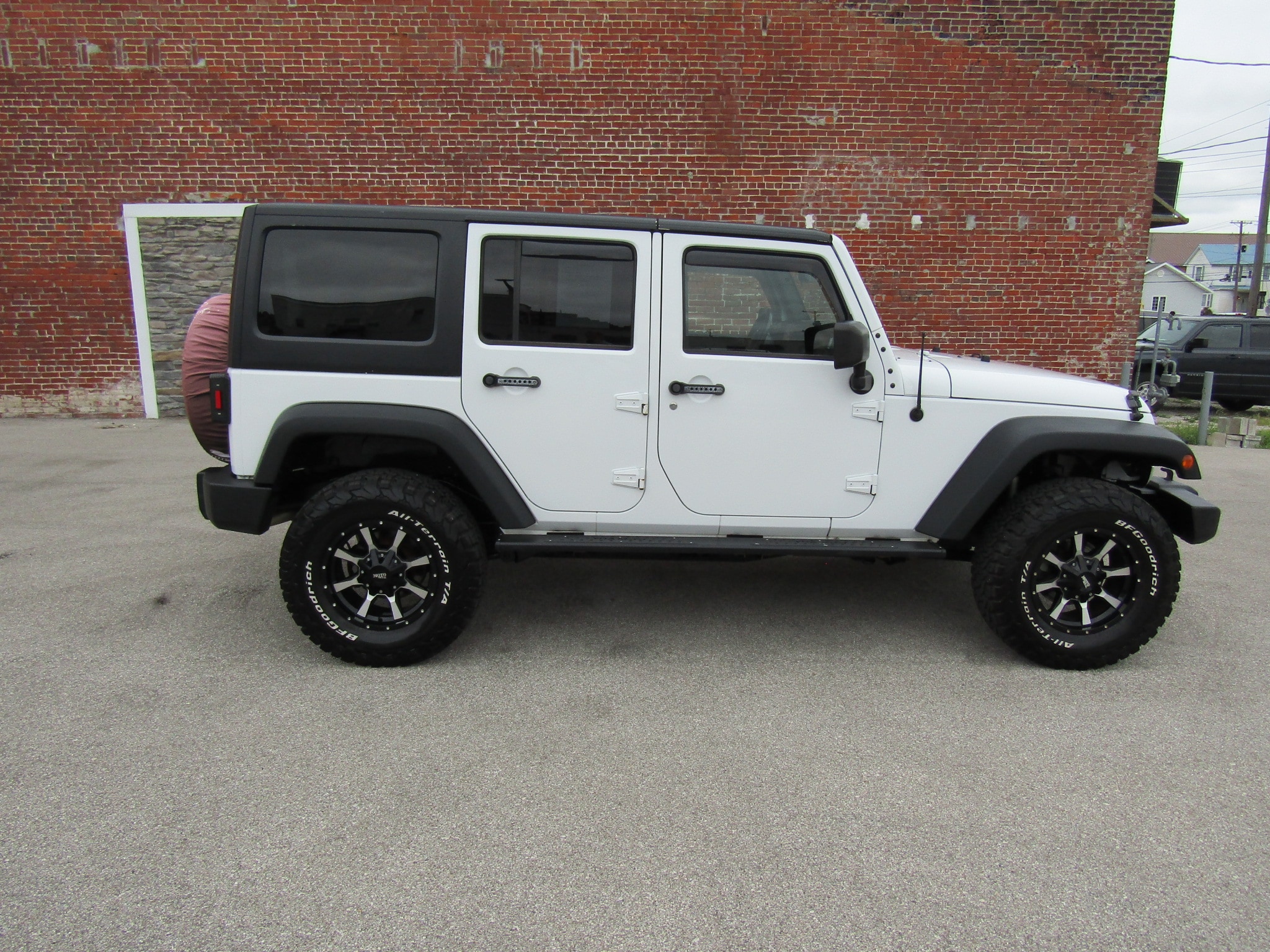 Used 2015 Jeep Wrangler Unlimited Sport with VIN 1C4BJWDG0FL738792 for sale in Washington, IN