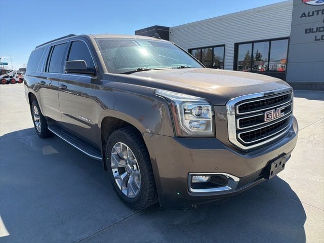 Used 2015 GMC Yukon XL SLT with VIN 1GKS2HKC8FR614473 for sale in Watertown, SD