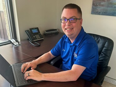 Staff member Jon Strand from ID_a69628