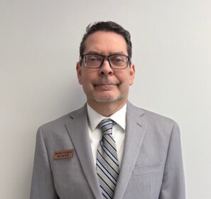 Staff member William Ryan from ID_b3402c70215e