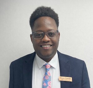 Staff member Fred Mutoni from ID_ab5615402025