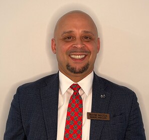 Staff member MANNY ANDUJAR from ID_034bba2f2247