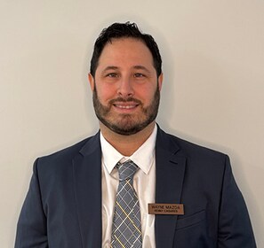 Staff member KENNY CASARES from ID_c76752c5d8fd