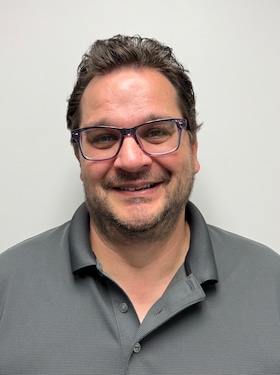 Staff member Travis Zuker from ID_8e62ea2cd95c