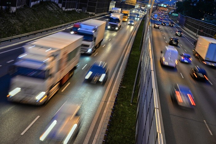 Cars_Driving_On_Highway.jpg