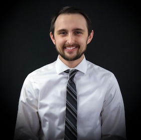 Staff member Dylan Ludovissie from 2b4b605d8cb3