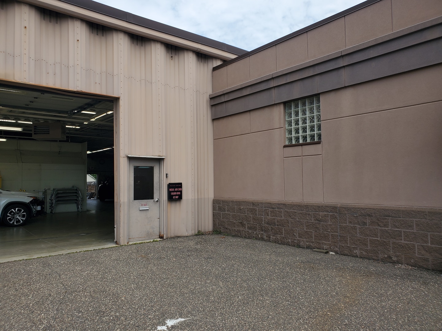  Person cheerfully signing documents.