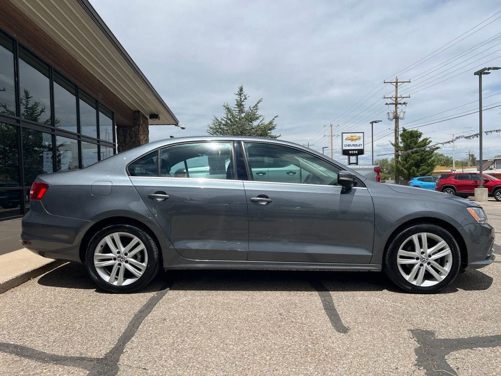 Used 2015 Volkswagen Jetta SEL with VIN 3VWL07AJ9FM320806 for sale in Cortez, CO