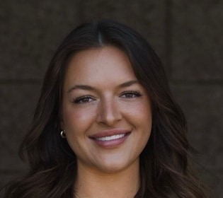 Staff member Taylor Lambert from ID_208987