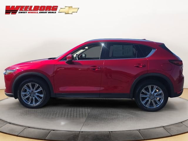 Used 2021 Mazda CX-5 Grand Touring with VIN JM3KFBDMXM1452853 for sale in Glencoe, Minnesota