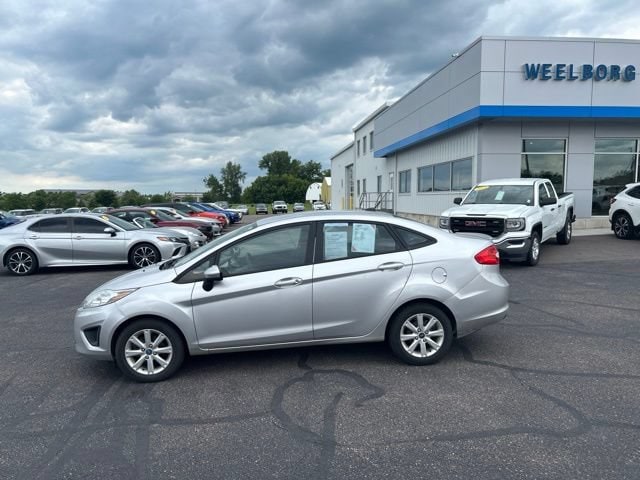 Used 2011 Ford Fiesta SE with VIN 3FADP4BJ0BM221520 for sale in New Ulm, Minnesota