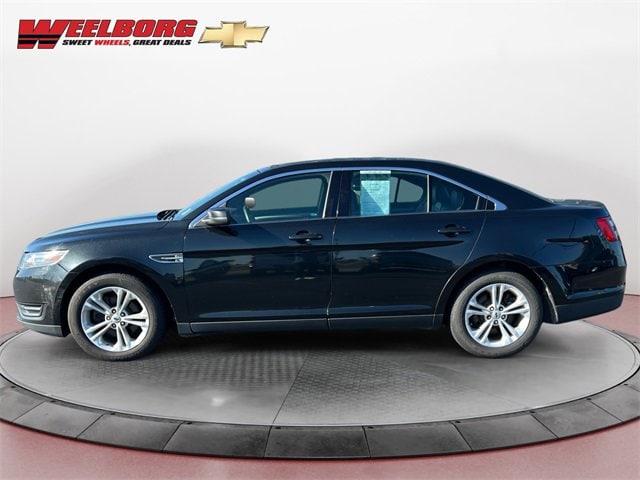 Used 2014 Ford Taurus SEL with VIN 1FAHP2E89EG130985 for sale in New Ulm, Minnesota