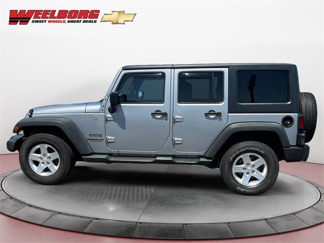 Used 2014 Jeep Wrangler Unlimited Sport with VIN 1C4HJWDGXEL227583 for sale in New Ulm, Minnesota