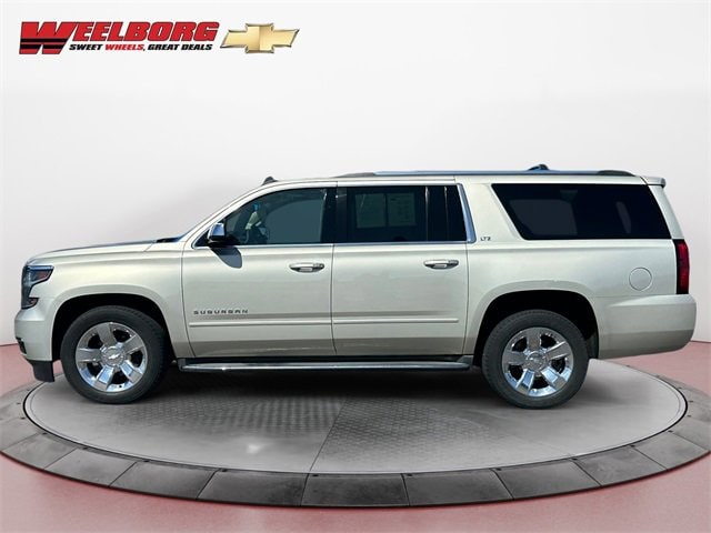Used 2015 Chevrolet Suburban LTZ with VIN 1GNSKKKC8FR132554 for sale in New Ulm, Minnesota