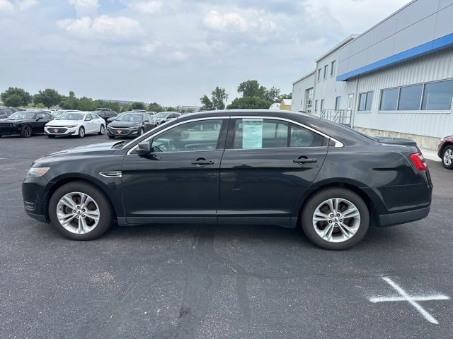 Used 2014 Ford Taurus SEL with VIN 1FAHP2E89EG130985 for sale in New Ulm, Minnesota