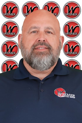 Staff member Christopher Whetzel from 032380c249fe