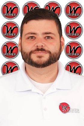 Staff member Dennis Dawson from 032380c249fe