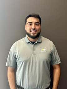Staff member Christian Bautista (Hablo Español) from ID_a130a8