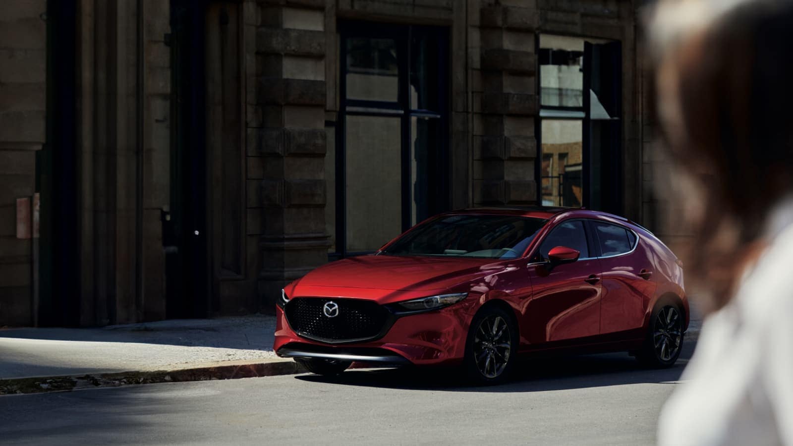 2025-mazda-3-hatchback-soul-red-exterior_d.jpg