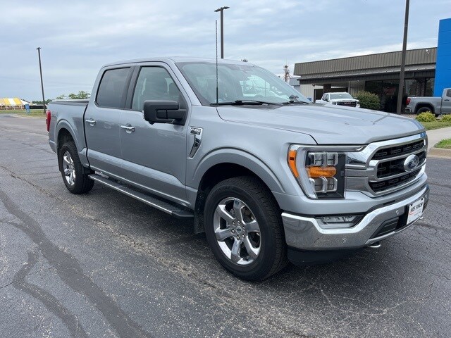 Used 2021 Ford F-150 XLT with VIN 1FTFW1E86MKE82366 for sale in Grinnell, IA