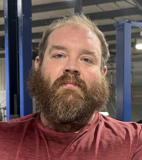 Staff member Jordan Moore from ID_321842