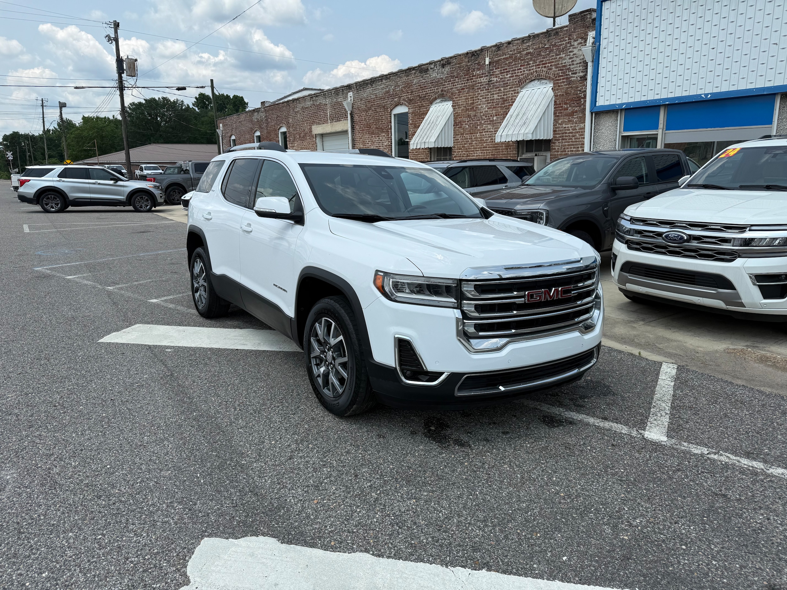 Used 2023 GMC Acadia SLT with VIN 1GKKNML47PZ212128 for sale in Sulligent, AL