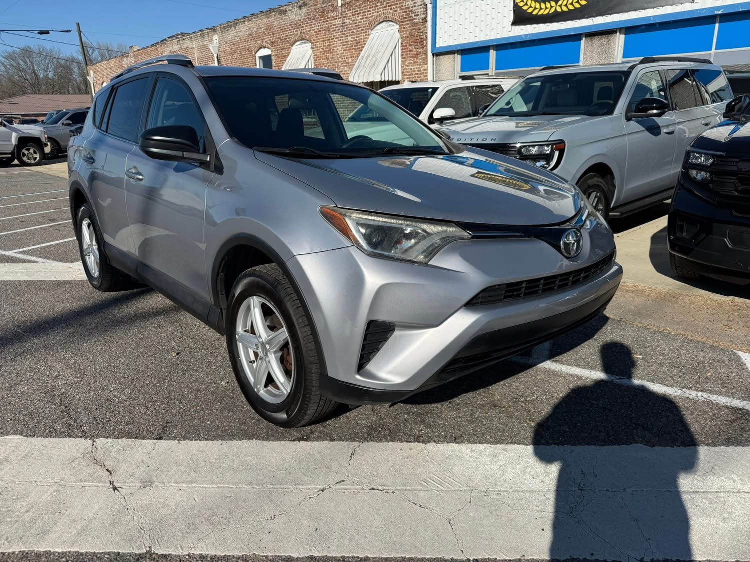Used 2016 Toyota RAV4 LE with VIN 2T3ZFREV9GW293076 for sale in Sulligent, AL
