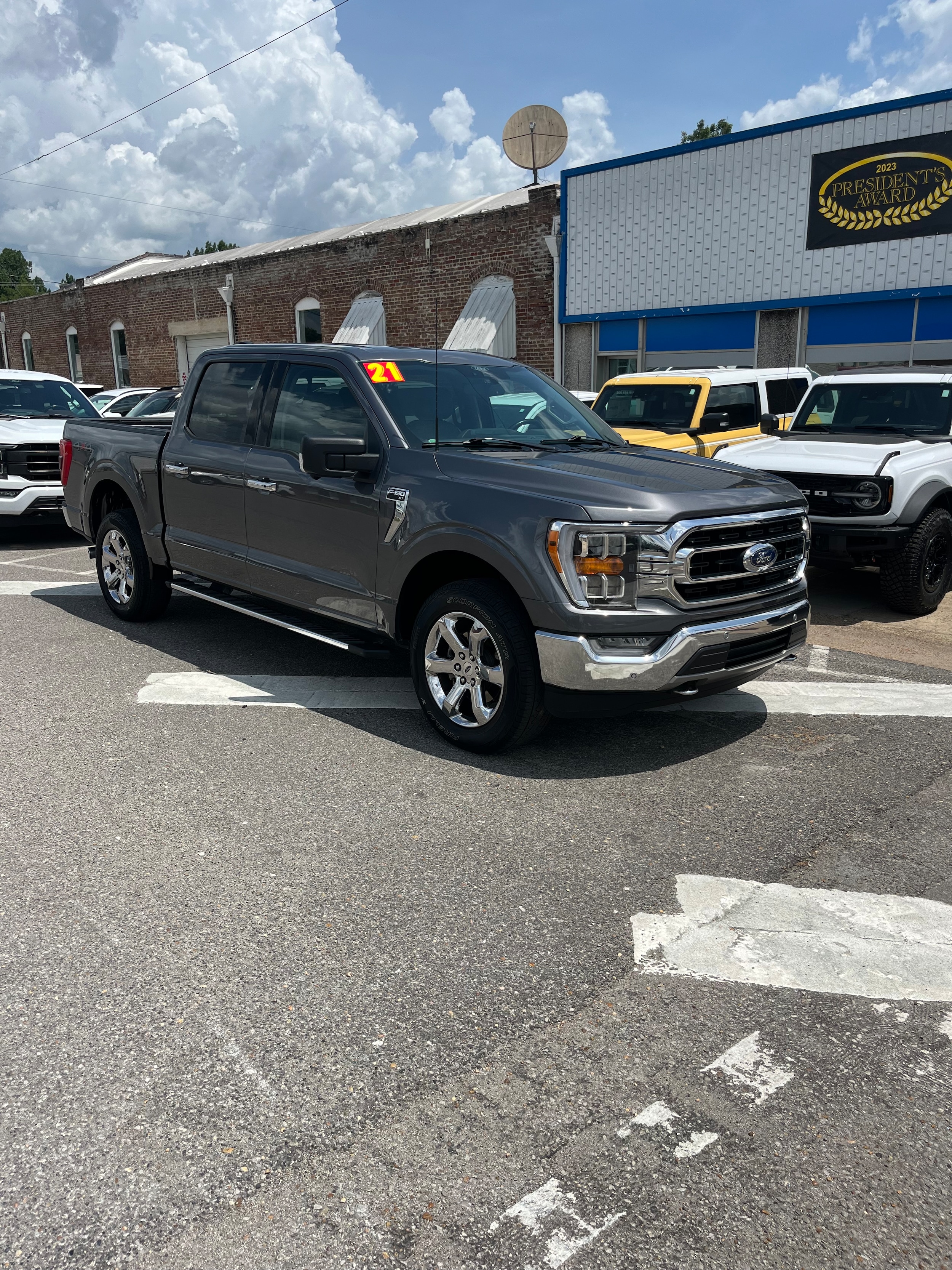 Used 2021 Ford F-150 XLT with VIN 1FTFW1E54MFB68634 for sale in Sulligent, AL