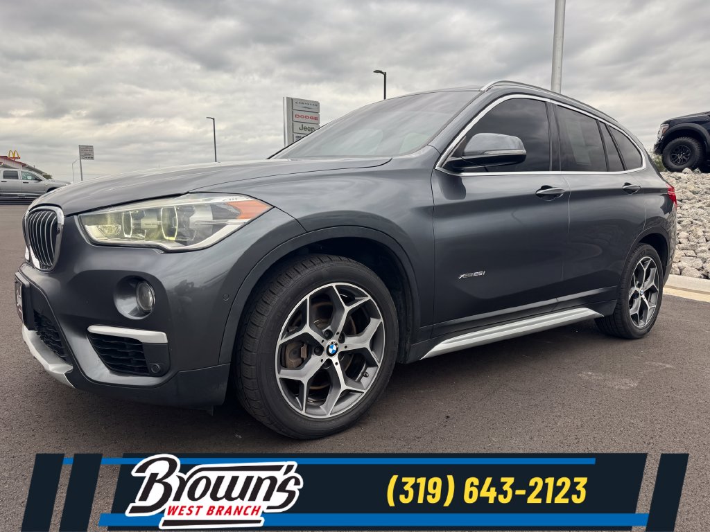 Used 2018 BMW X1 28i with VIN WBXHT3C37J5F88331 for sale in West Branch, IA
