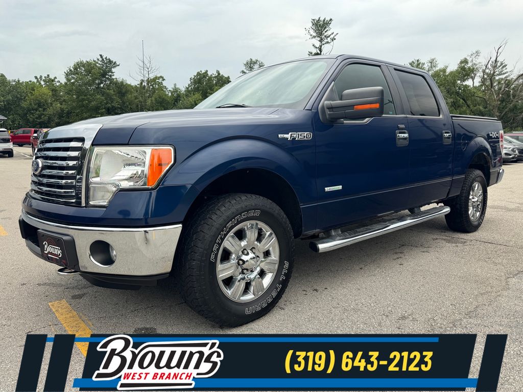 Used 2011 Ford F-150 XLT with VIN 1FTFW1ET9BFD23805 for sale in West Branch, IA
