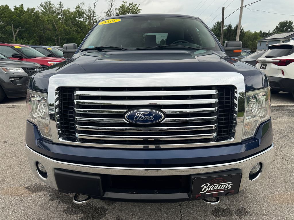 Used 2011 Ford F-150 XLT with VIN 1FTFW1ET9BFD23805 for sale in West Branch, IA