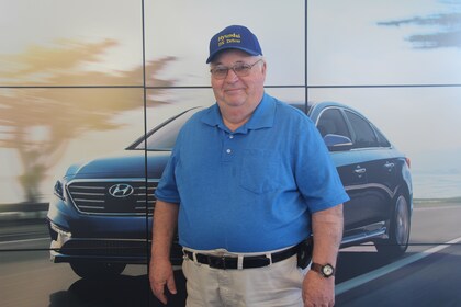 Staff member Robbie Robinson from d6578e798b64