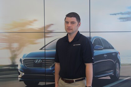 Staff member Rhett Tate from d6578e798b64