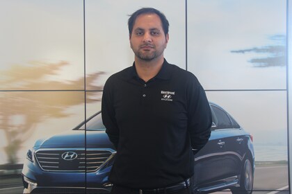 Staff member Ali Malik from d6578e798b64