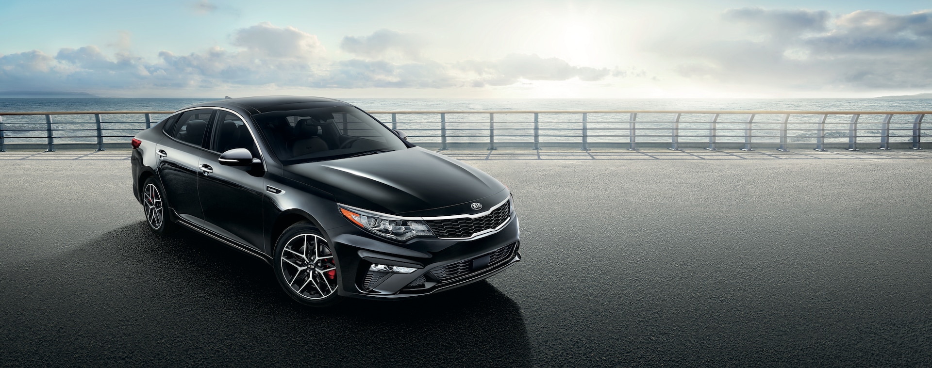 West Broad Kia is a Kia Dealership in Richmond near Tuckahoe, VA | 2020 Kia Optima parked by ocean